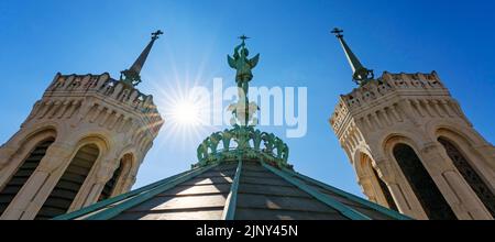 View of Saint-Michel statue on the top of notre-dame-de-Fourviere basilica in Lyon, France Stock Photo