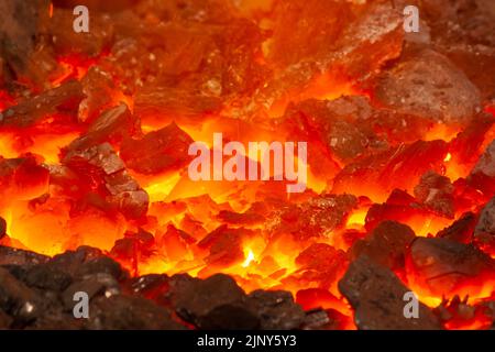 close up of hot coals in blacksmith brazier Stock Photo