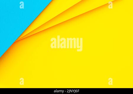 Abstract colored paper background. Minimal geometric shapes and lines in light blue and yellow colors Stock Photo