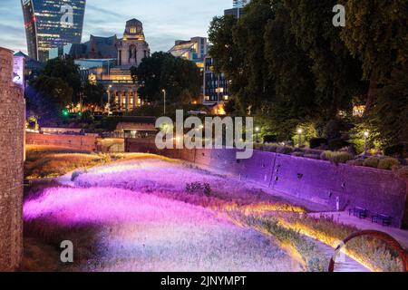 Tower of London, UK, 2022.  The Superbloom at Tower of London at ducs, illuminated with colourful lights.  A popular evenign tourist attraction, this Stock Photo
