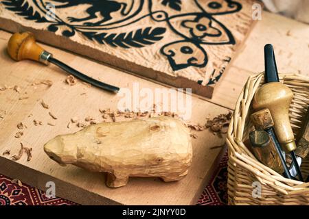 Wooden stamps for medieval ink printing on fabric and vintage clothing. Reconstruction of the events of the Middle Ages in Europe. Stock Photo