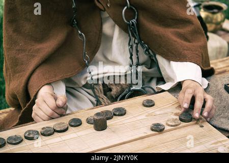 Ludus Latrunculorum, or Latrunculi, is an ancient Roman strategy game. Reconstruction of board games from the Roman Empire Stock Photo