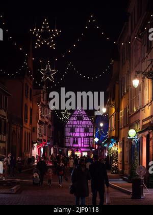 Colmar, France - December 13, 2021: Magical Christmas in Colmar. Amongst the most attractive and atmospheric Christmas markets in all of France. Color Stock Photo