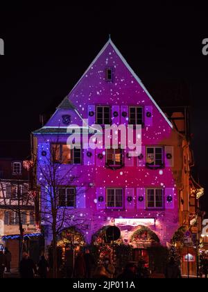 Colmar, France - December 13, 2021: Magical Christmas in Colmar. Amongst the most attractive and atmospheric Christmas markets in all of France. Color Stock Photo