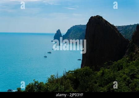 Cape fiolent crimea sky rock view sea russia cliff balaklava, concept tourism nature from horizon from bay boat, mountains ay. Picturesque black Stock Photo