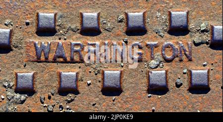 Warrington grids, ironwork, road, covers, Cheshire, England, UK Stock Photo