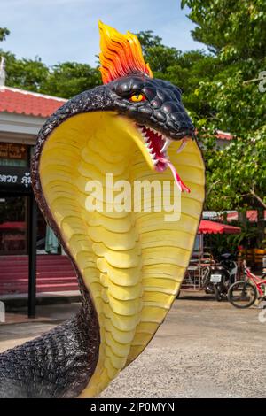 Chachoengsao Thailand 9th Jun 2022: the Phaya Nak statue in Wat Saman Rattanaram, which is famous for image of bright pink Ganesha. Stock Photo