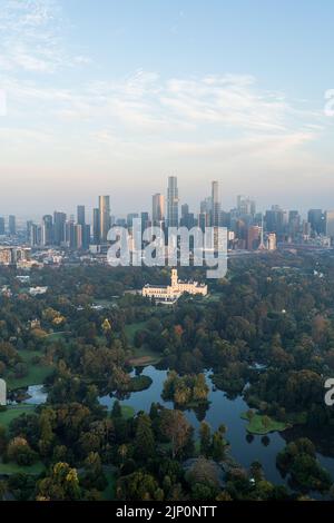 Melbourne skyline with the Royal Botanic Gardens and the Government's House in the foreground Stock Photo