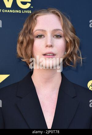 Hannah Einbinder walking on the red carpet at the 2025 Vanity Fair