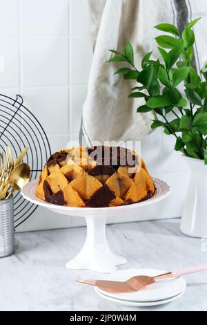 Bundt Marble Caek on Cake Stand, Copy Space for Text Stock Photo