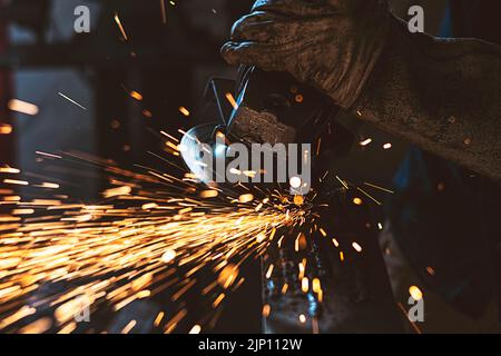 cutting that metal in the shop Stock Photo