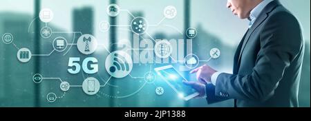 5G Network Wireless Internet concept. Man touching 3D icon 5G Stock Photo