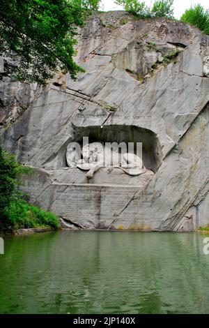 The Lion Monument or the Lion of Lucerne, is a rock relief in Lucerne, Switzerland Stock Photo