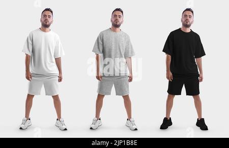 Template white, black, heather oversized t-shirt, shorts on a brutal man in sneakers, folded clothes front view, for design. Set of a suit isolated on Stock Photo