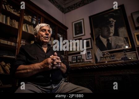 Forli, Italy. 10th Aug, 2022. Domenico Morosini sits in Forli in Benito Mussolini's former residence, which he bought from the Duce's family at the turn of the millennium and converted into a private museum. Italy will elect a new government on Sept. 25, 2022, with Giorgia Meloni's post-fascist 'Fratelli d'Italia' party expected to win. (to dpa 'Italy's election favorite Meloni and fascism - 'worry is real'') Credit: Oliver Weiken/dpa/Alamy Live News Stock Photo