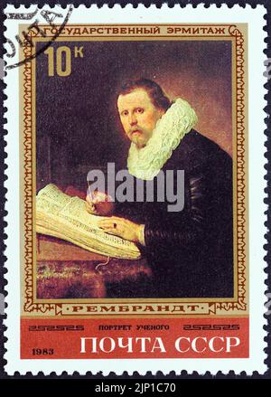 USSR - CIRCA 1983: A stamp printed in USSR from the 'Rembrandt Paintings in Hermitage Museum, Leningrad' issue shows Portrait of a Learned Man. Stock Photo