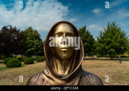 Budapest, Hungary -August 7, .2022:  Portrait of the statue of Satoshi Nakamoto mysterious founder of Bitcoin and Blockchain technology in; created by Stock Photo