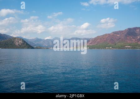 The coast of Turkey near Marmaris city, where the mountains meet the Mediterranean Sea. The shores of Turkey's Mugla province. Mountain hills after bi Stock Photo