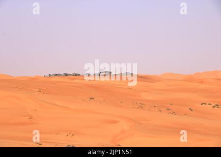 Bedouin style camping beside a huge sand dune at the Wahiba Sands desert in Oman. Stock Photo