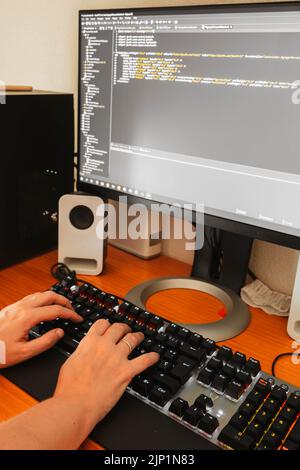Programming work time. Programmer Writing new lines of HTML code. Portable and manual closure. Working time. Web Design Business Concept Stock Photo