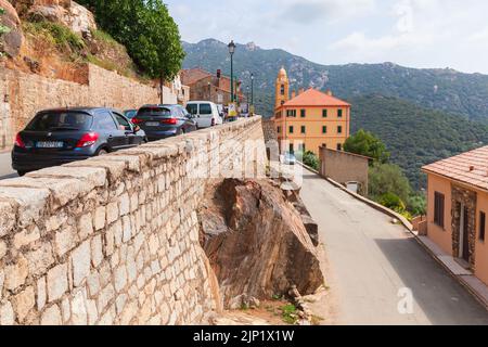 Olmeto, France - August 25, 2018: Street view with cars waiting for green traffic lights. Olmeto, Corse-du-Sud department of France on the island of C Stock Photo