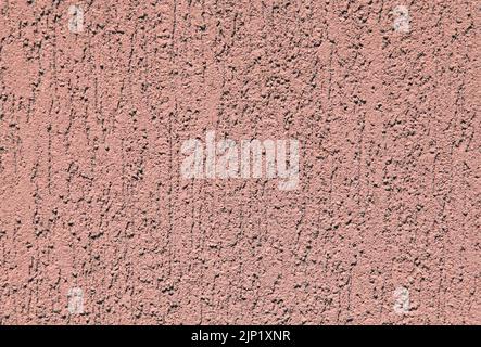 Rose wall, texture, background. Plastered building wall. Rough, textured and decorated surface with vertical embossed pattern. Pink, rosy backdrop Stock Photo