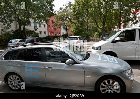 Berlin, Germany. 15th Aug, 2022. The hoods and doors of several cars have been taped over after swastikas were scratched into doors hoods of the cars. (to dpa 'More swastikas discovered on car hoods in Berlin') Credit: Carsten Koall/dpa/Alamy Live News Stock Photo