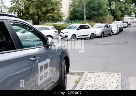 Berlin, Germany. 15th Aug, 2022. The doors of several cars have been taped over after swastikas were scratched into the doors and hoods of the cars. (to dpa 'More swastikas discovered on car hoods in Berlin') Credit: Carsten Koall/dpa/Alamy Live News Stock Photo