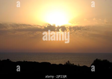 Golden Sunset over the mediterranean sea Stock Photo