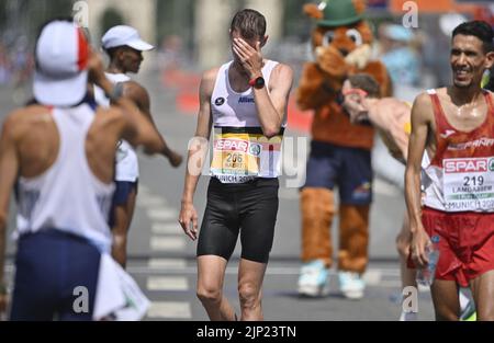 Munich, Germany. 15th Aug, 2022. Belgian Koen Naert reacts after the men marathon race on the first day of the Athletics European Championships, at Munich 2022, Germany, on Monday 15 August 2022. The second edition of the European Championships takes place from 11 to 22 August and features nine sports. BELGA PHOTO ERIC LALMAND Credit: Belga News Agency/Alamy Live News Stock Photo