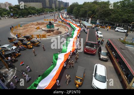 Chennai, India. 15th Aug, 2022. Tamil Nadu Congress workers carrying a 1000-meter-long tricolour in a rally take out a 'Tiranga Rally' in Chennai Credit: Seshadri SUKUMAR/Alamy Live News Stock Photo