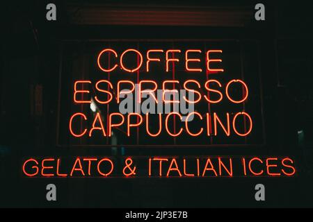 Vintage neon signs at night at La Bella Ferrara, in Little Italy, Manhattan, New York Stock Photo