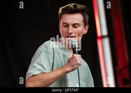 Northlands Race Track, Canada. 14th Aug, 2022. Trevor Wallace performs at the Great Outdoor Comedy Festival. Credit: SOPA Images Limited/Alamy Live News Stock Photo