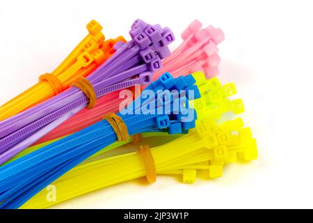 Multicolor cable zip ties on white background Stock Photo