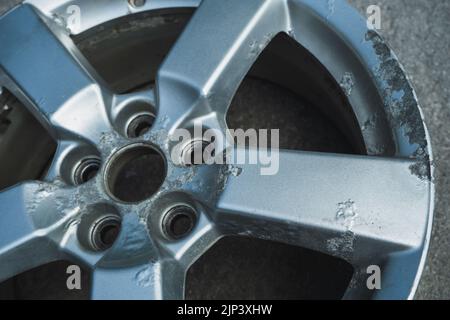 Corrosion on a silver aluminum alloy wheel close-up Stock Photo