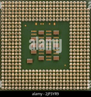 Computer CPU Processor Chip, view from the bottom side, pin connectors. Stock Photo