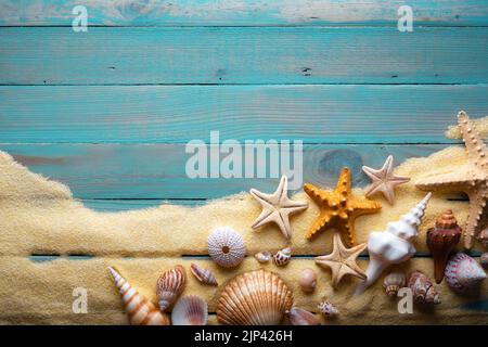 Colorful Starfish and seashell marine decoration with space copy on wooden  background Stock Photo - Alamy