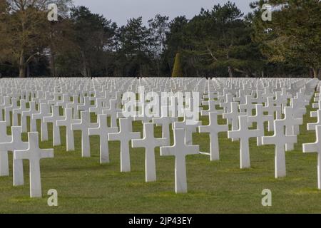 The Normandy American Cemetery with white crosses in memory of the fallen soldiers in France Stock Photo