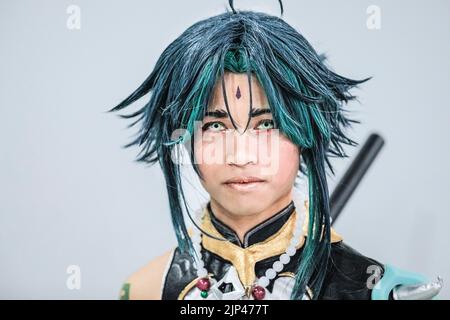 Cosplayer as Japanese anime girl warrior character, portrait, MCM Comic Con London Stock Photo