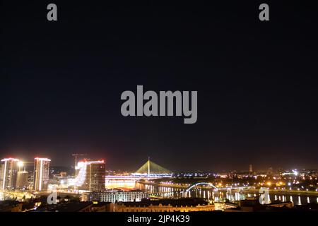 Panoramic night view on Belgrade, (Beograd in Serbian), or river Danube and old but also new part of town Stock Photo