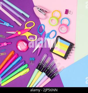 Colorful background with back to school supplies. Flat lay. Creative arrangement. full colored Stock Photo