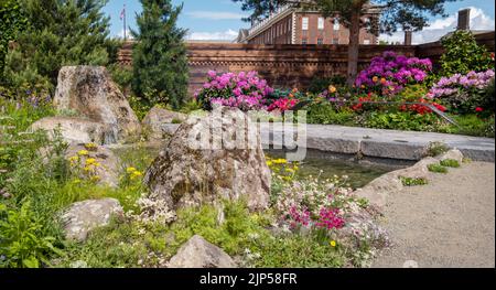 A Swiss Sanctuary garden at the Chelsea Flower Show 2022 designed by Lilly Gomm. Stock Photo
