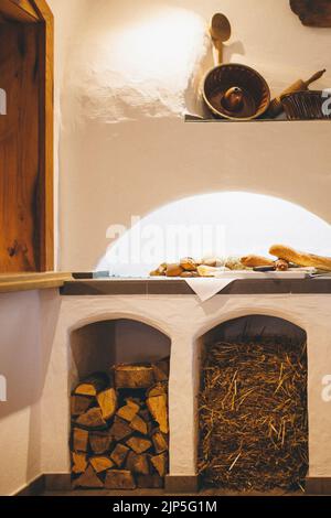 Different types of bread on the table in the kitchen. Stock Photo