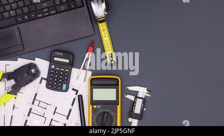 Architecture and business table with plans and construction tools. Flat lay copy space Stock Photo