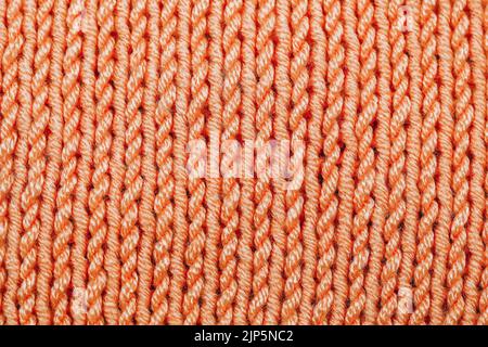 Knitted woolen texture background. Warm sweater, pullover pattern closeup Stock Photo