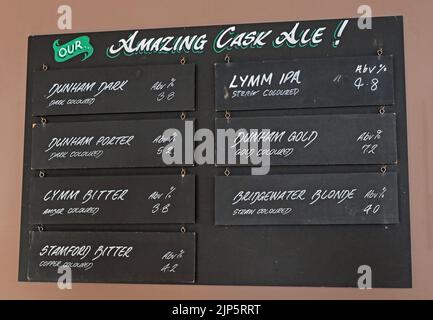 Cask ale list at the brewery tap, Dunham Massey Brewing Company, 18 Bridgewater St, Lymm, Warrington, Cheshire, England, UK, WA13 0AB Stock Photo