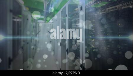 Image of spots over server room Stock Photo