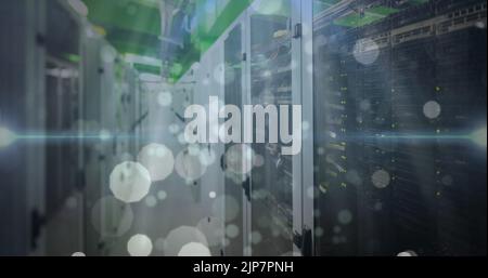 Image of spots over server room Stock Photo
