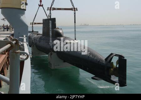 The Royal Danish Navy submarine Her Danish Majesty's Ship HDMS Saelen is lifted aboard the German contract vessel Grietje -c Stock Photo