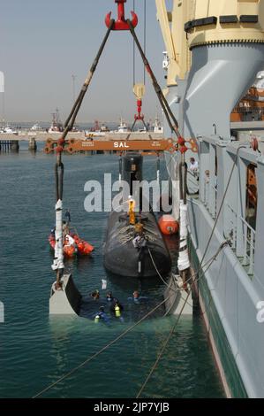 The Royal Danish Navy submarine Her Danish Majesty's Ship HDMS Saelen is lifted aboard the German contract vessel Grietje -e Stock Photo